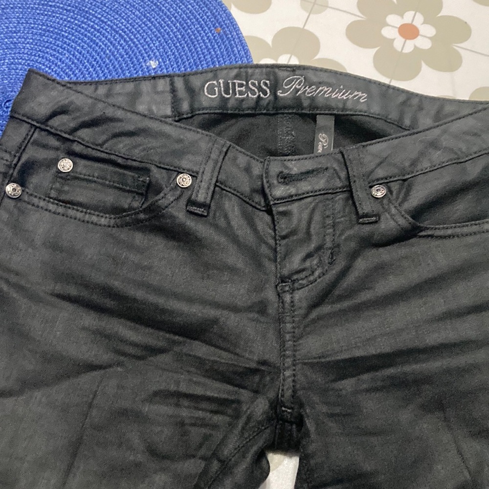 Guess Premium black shiny low rise skinny jeans.